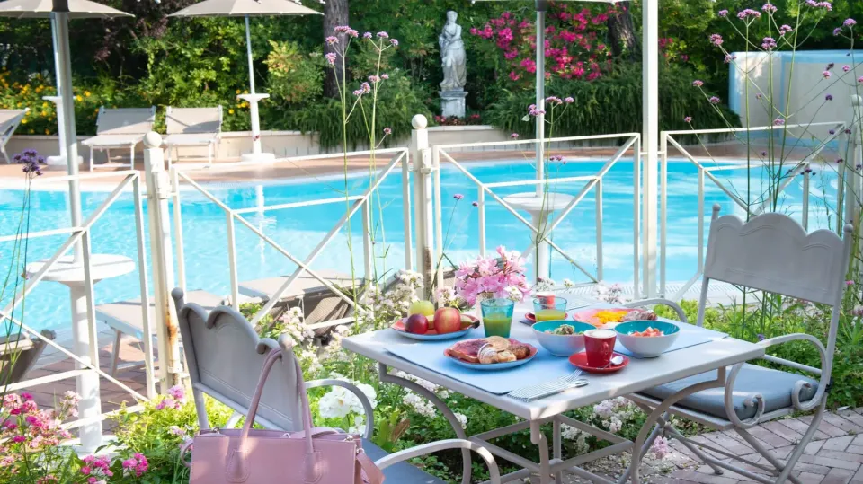 Brunch by the pool at the Gabbiano Park Residence