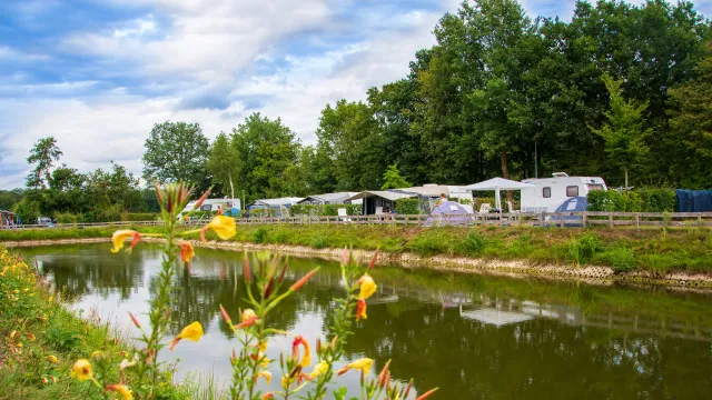 Camping pitches overlooking a fishing pond