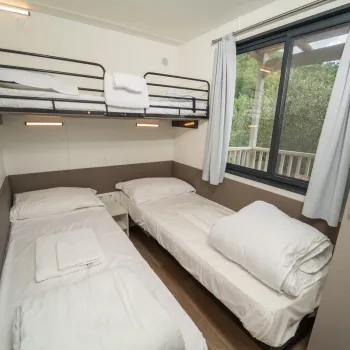 Bedroom with bunk bed, single bed.