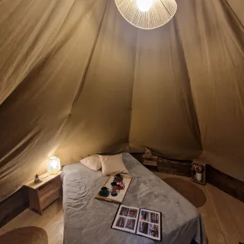 Interior of Tipi tent with double bed