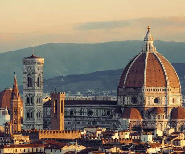 Florence skyline with the Duomo at sunset.
