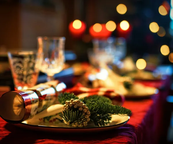 A dinner table with winter decorations